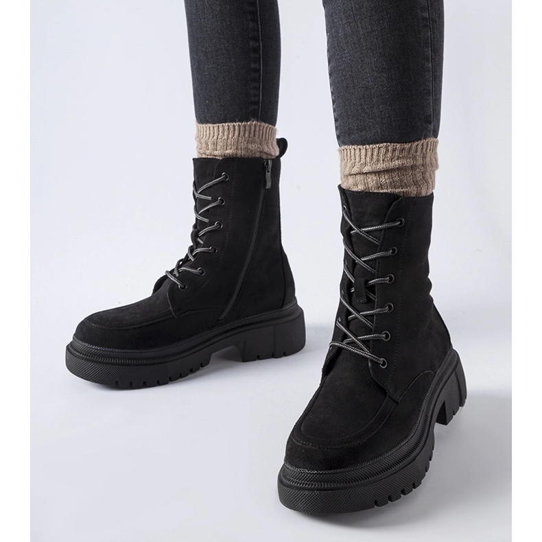 Schwarze Sneaker mit massiver Riel-Sohle 1