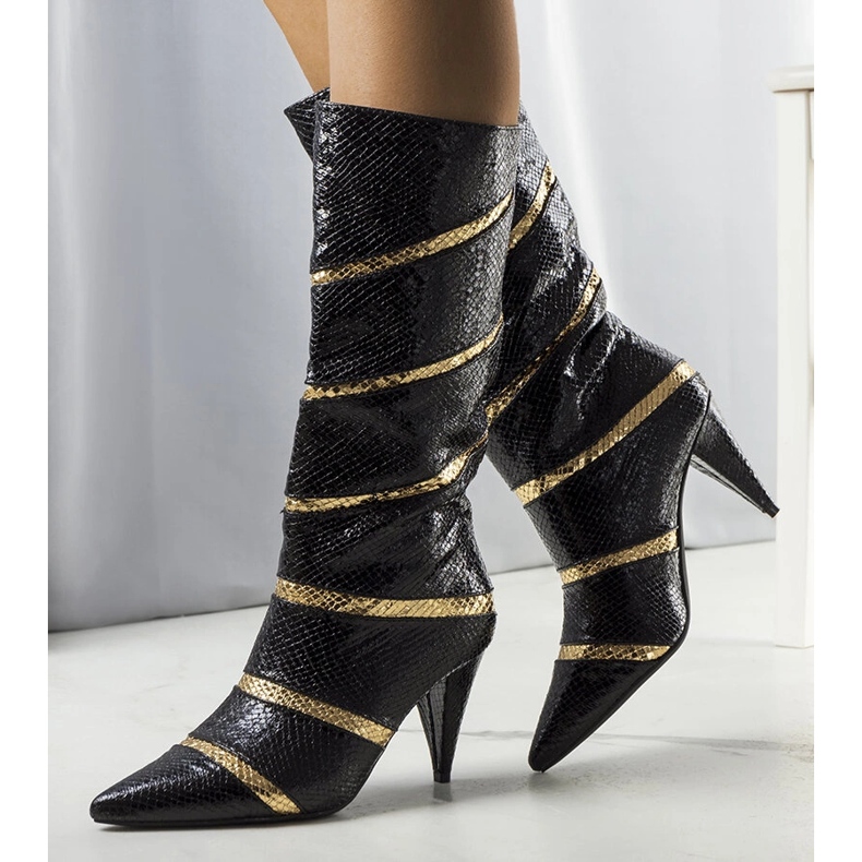 Schwarz-goldene isolierte Nevzo-Stiefel 1