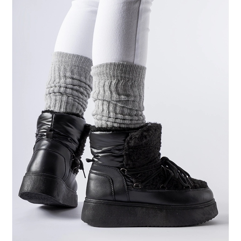 Schwarze Schneestiefel auf einer massiven Elvio-Plattform 1