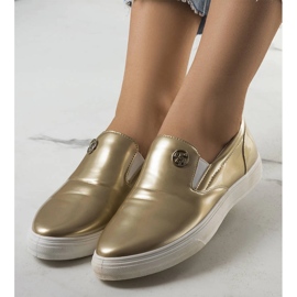 Goldene Slip-On-Sneaker von Taastru 1