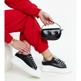 Schwarze Sneakers auf der GOE NN2N4034-Plattform 1