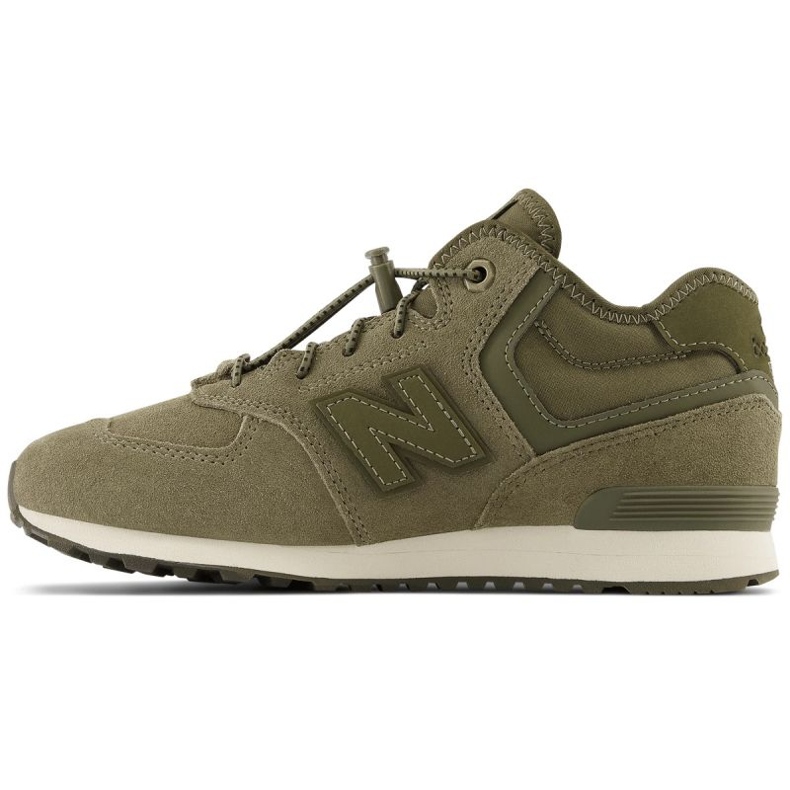New Balance W JrGV574HG1 isolierte Schuhe grün 1