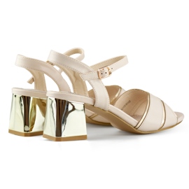 Elegante beige Damensandalen mit goldenem Absatz 1