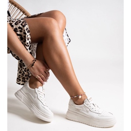 Beigefarbene Sport-Sneaker aus Leder 1