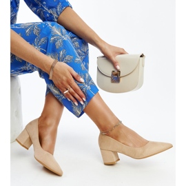 Beigefarbene Pumps mit hohem Absatz und Paris-Ledereinsatz 1