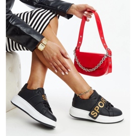 Schwarze Lederschuhe mit dekorativer Schnalle 1