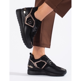 Schwarze Sportschuhe für Damen 1