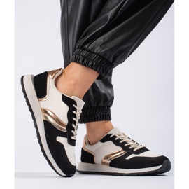 Schwarze Sportschuhe für Damen 1