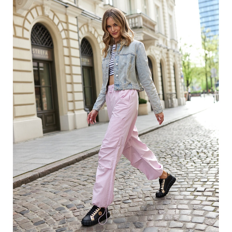 Schwarz-goldene Sneaker mit massiver Bionda-Sohle 1