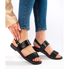 Schwarze flache Damensandalen 1