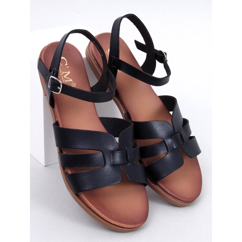 Manzo Schwarze flache Damensandalen 1