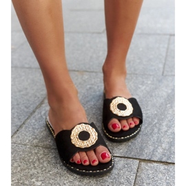 Schwarze Flip-Flops mit Ledereinsatz von Buenas 1