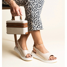 Goldene Slip-On-Sandalen mit Taylak-Glanz 1