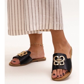 Schwarze Flip-Flops, verziert mit einer Perkin-Schnalle 1