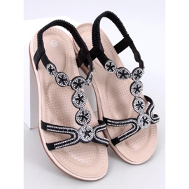 Yvers Schwarze Sandalen mit dekorativen Zirkonen 1