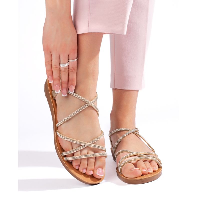 Goldene Slip-On-Sandalen mit Strasssteinen 1