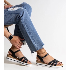 Schwarze Hikma-Sandalen mit niedrigem Keilabsatz 1