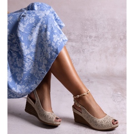 Beigefarbene Sakna-Keilsandalen 1