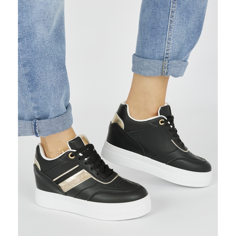 Schwarze Sneakers mit verstecktem Keilabsatz 1