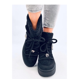 Schwarze Schneestiefel aus Schaffell 2