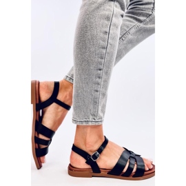 Schwarze flache Damensandalen 1