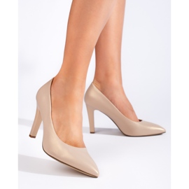 Klassische goldene Damenpumps von Sergio Leone 1