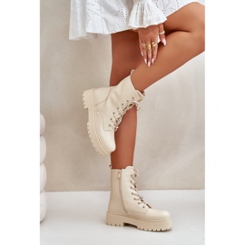 Isolierte Frauenstiefel mit beige Stiften 3