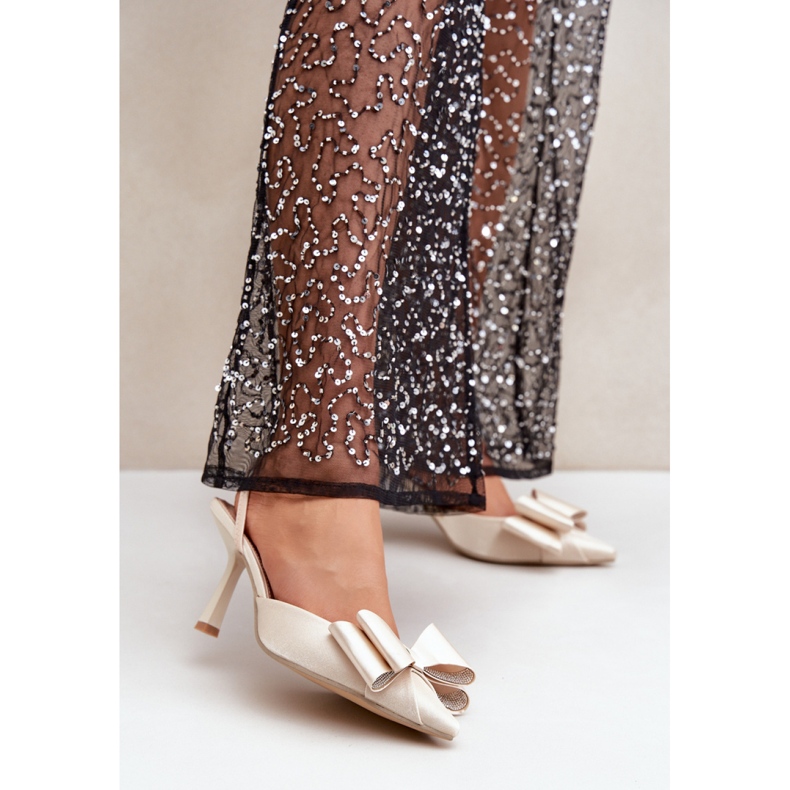 Step in style Elegante goldene Damen-High-Heels mit Schleife 1