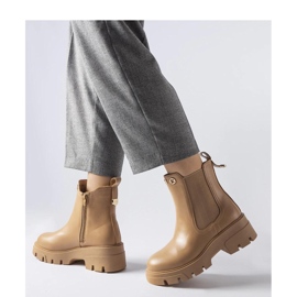 Beige isolierte dekorative Stiefeletten 1