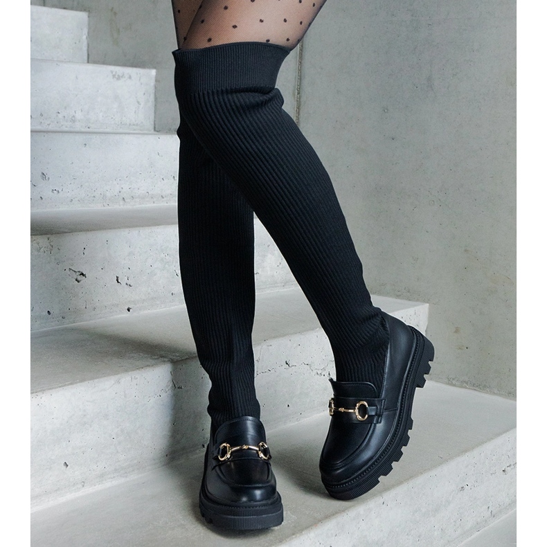 Schwarze Stiefel mit flexiblem Obermaterial und flachem Absatz 1