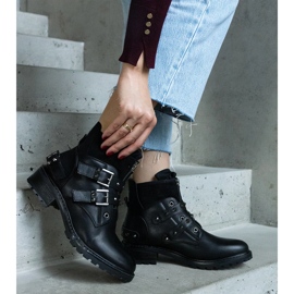 Schwarze, mit Nieten verzierte Stiefeletten mit flachem Absatz 1