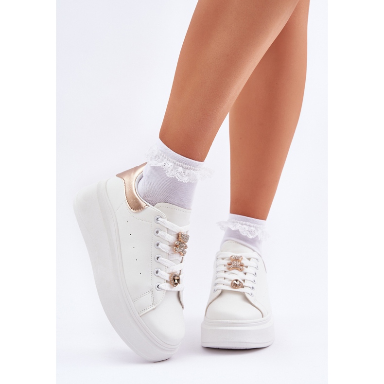 Frauen -Turnschuhe mit weißen Stiften 2