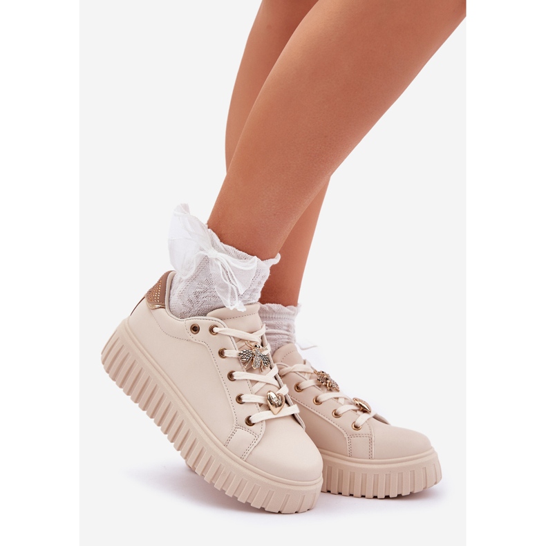 Frauen -Turnschuhe mit Stiften Beige 1