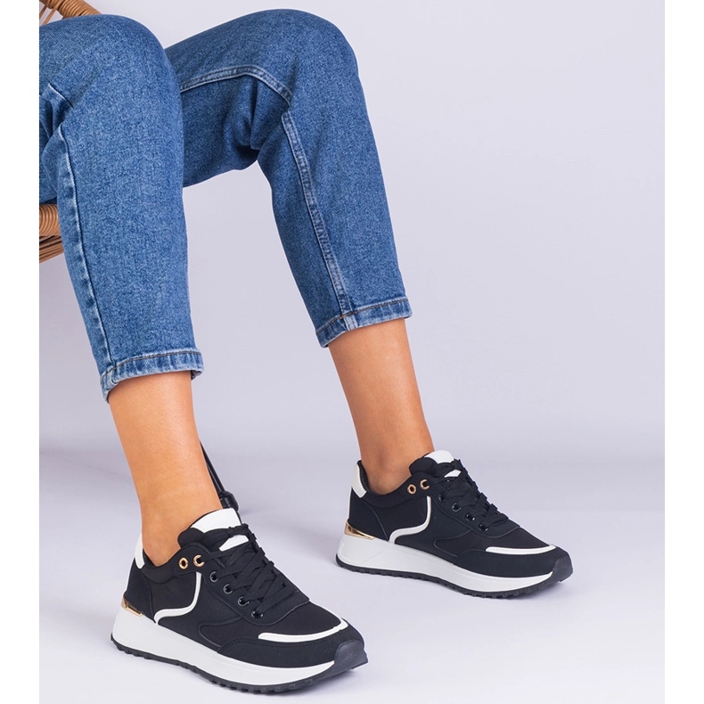 Schwarze Frauen -Turnschuhe mit goldenem Insertion 1