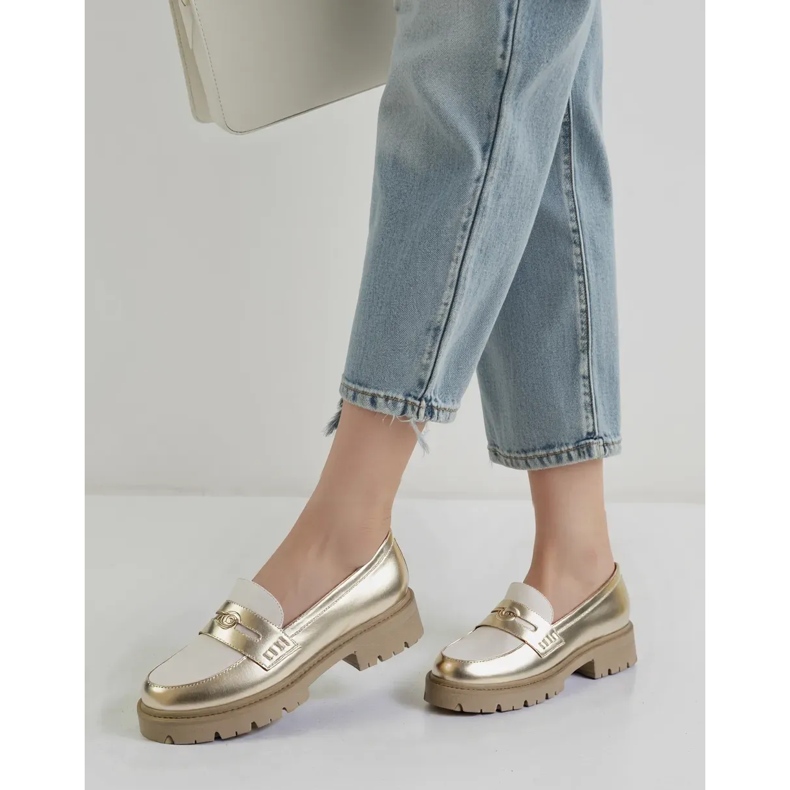 Frauen -Gold -Ladung golden 1