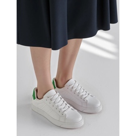 Frauen -Sneaker sind grün 1