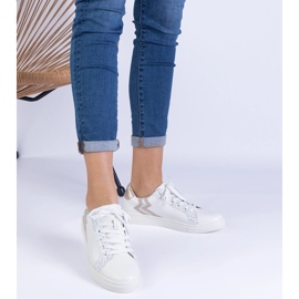 Weiße Sneaker von Frauen mit Prägung und Glitzer 1