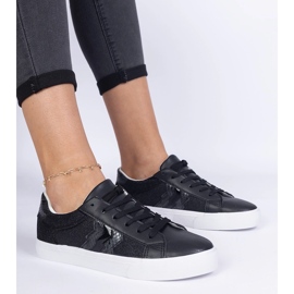 Schwarze Turnschuhe mit einem Tiermotiv, das mit Glitzer verziert ist 1