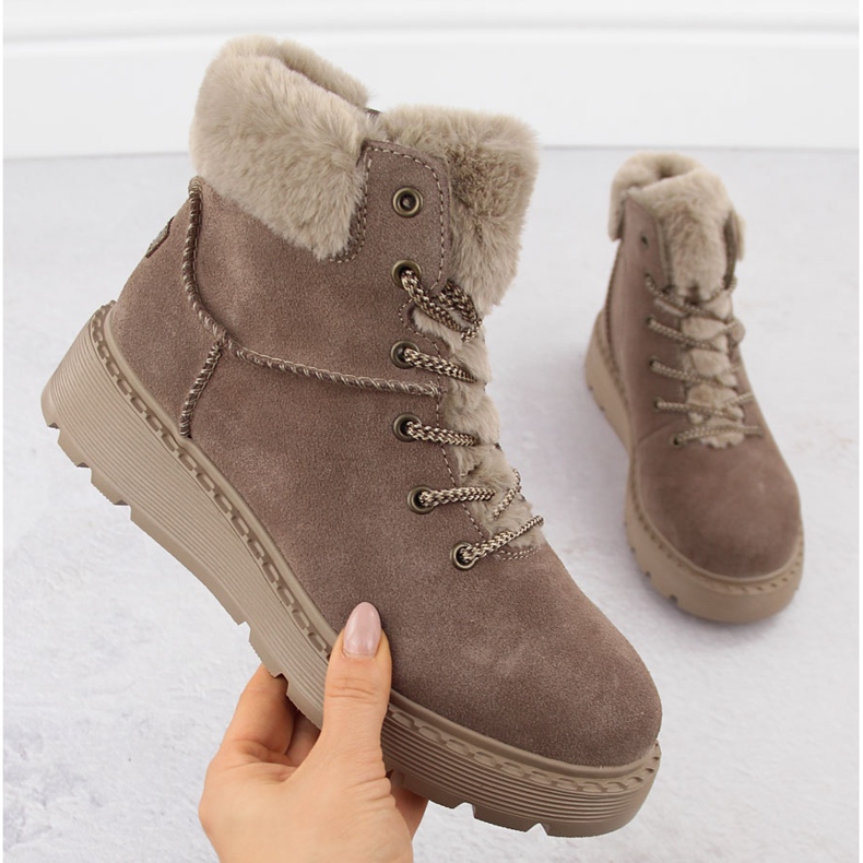 Damen-Lederstiefel mit Fell auf der braunen Plateausohle Rieker 70402-24 beige 1