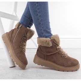 Damen-Lederstiefel mit Fell auf der braunen Plateausohle Rieker 70402-24 beige 4
