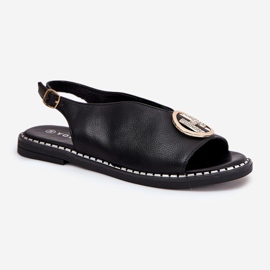 Flache elegante Sandalen mit einer schwarzen Dekoration 4