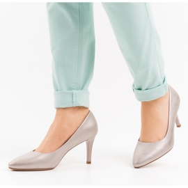 Goldene Damenpumps „Sergio Leone 1336“. 1