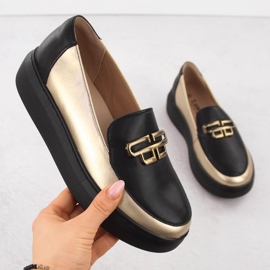 Damen-Lederschuhe auf der schwarzen und goldenen Plattform T.Sokolski W25-499 1