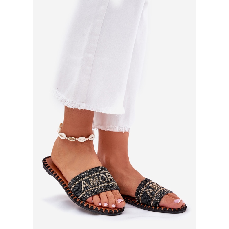 Flat -Tiefen -Flip -Flops mit schwarzer Dekoration 1