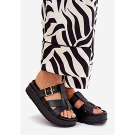 Die Flip -Flops für Frauen auf der Plattform mit Streifen und Schwarz klemmen 1