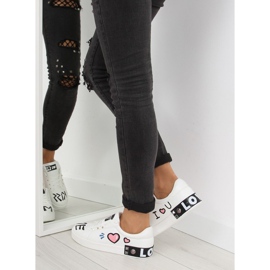 Weiße Turnschuhe mit Aufschrift T302 White 1