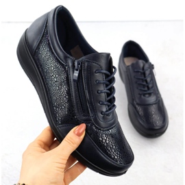 Frauensportschuhe mit einem komfortablen dunkelblauen Unisoft 9017 1