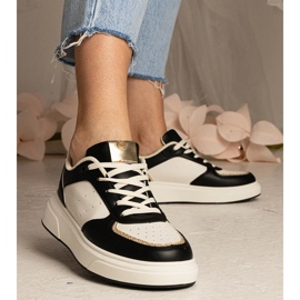 Schwarze Frauen -Turnschuhe mit Glitzerzubehör 3