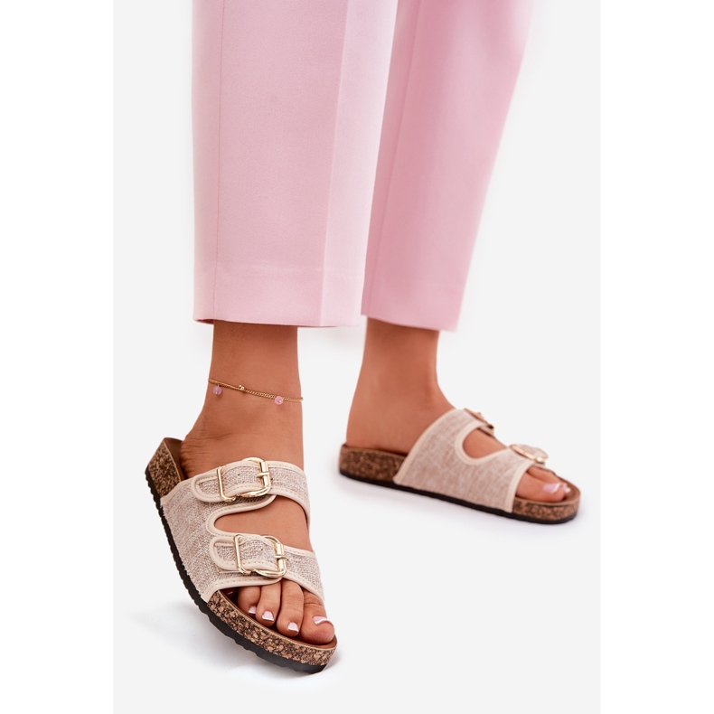 Frauenmaterial Flip Flops auf einer Korkplattform mit beige Schnallen 1