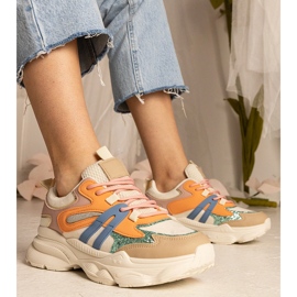 Orangefarbene Frauensport -Sneakers mit Glitzer 1